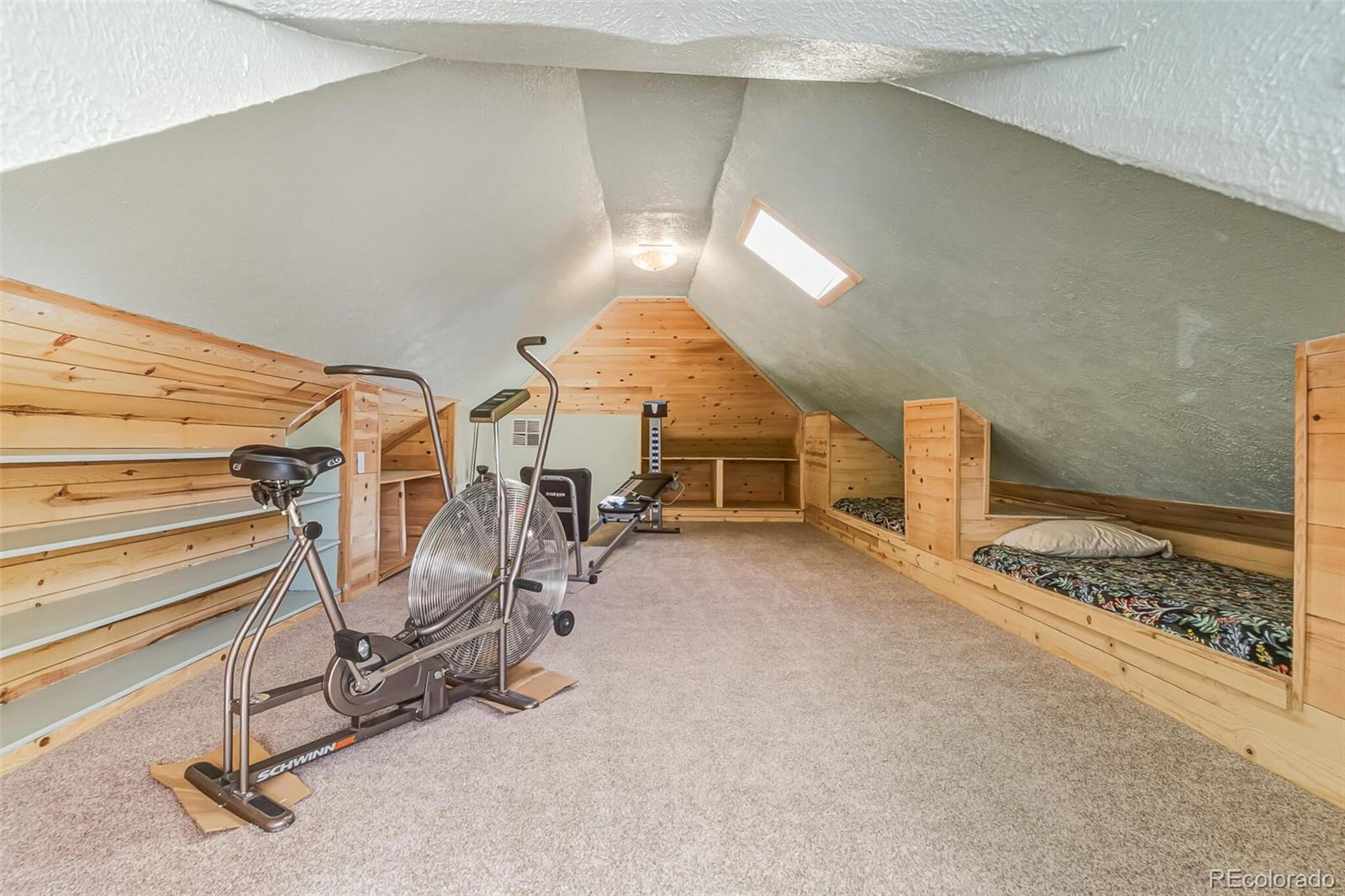 7221 West 48th Avenue Wheat Ridge, CO 80033 - Photo 26 of 42 a view of a room with gym equipment