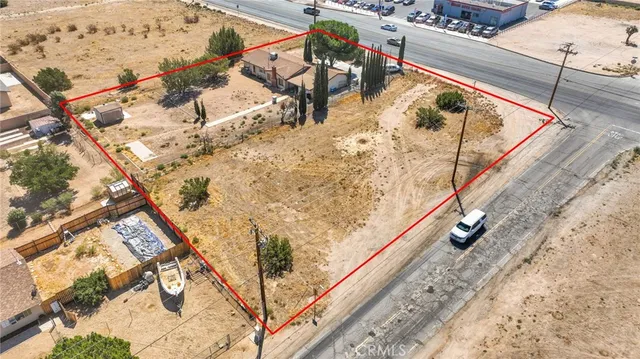 a view of swimming pool with a yard