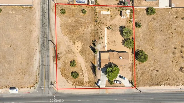 a view of a bathroom with a shower and a mirror