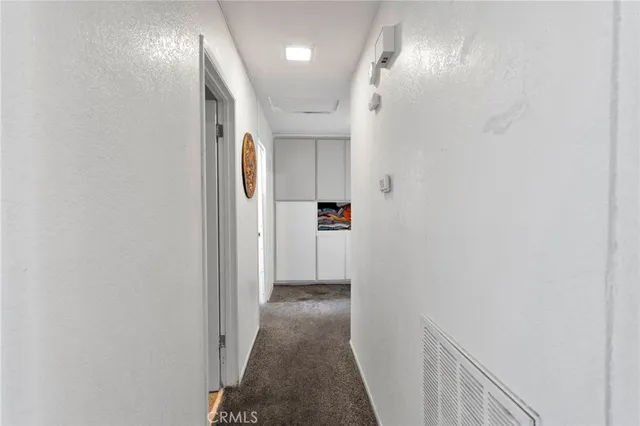 a view of hallway with stairs