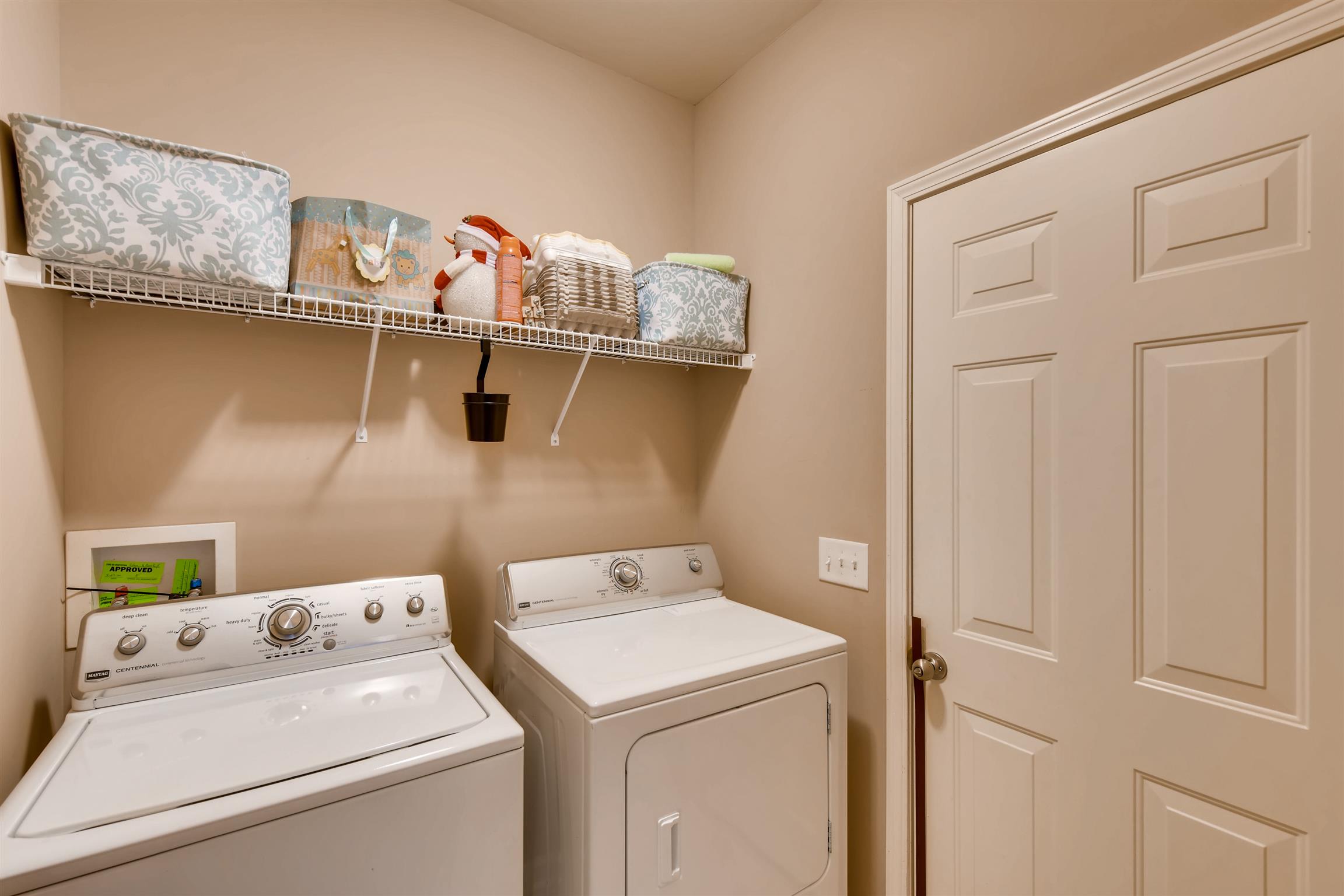 1054 Golf View Way Spring Hill, TN 37174 - Photo 14 of 16 a utility room with dryer and washer