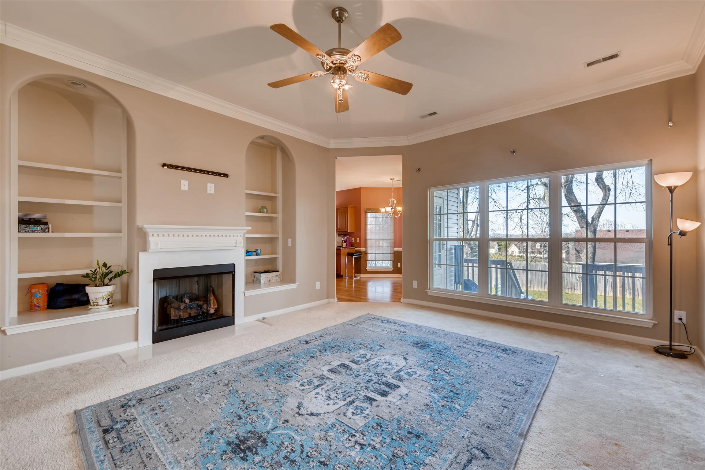 1054 Golf View Way Spring Hill, TN 37174 - Photo 3 of 16 a living room with furniture and a fireplace