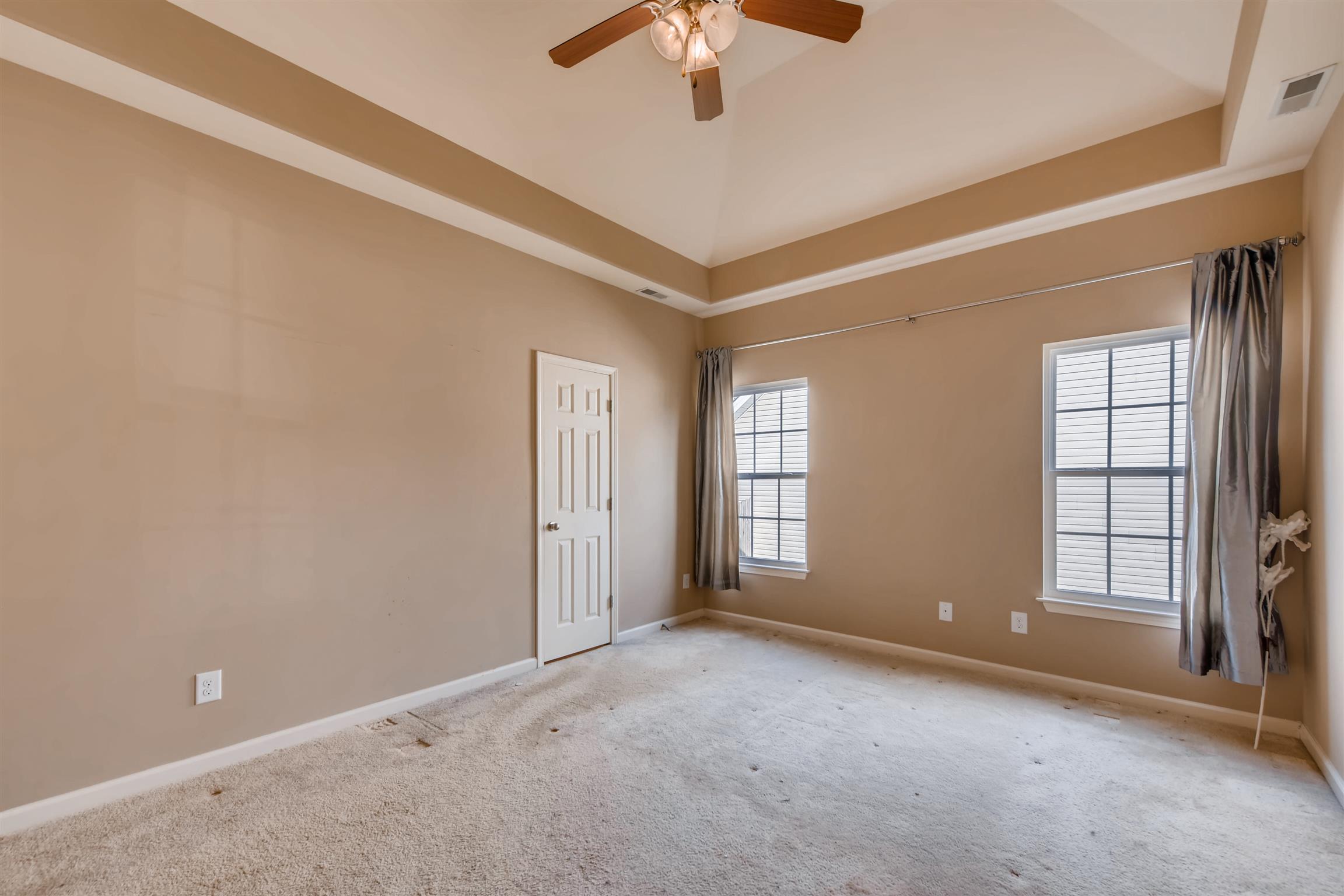 1054 Golf View Way Spring Hill, TN 37174 - Photo 9 of 16 a view of an empty room with a window
