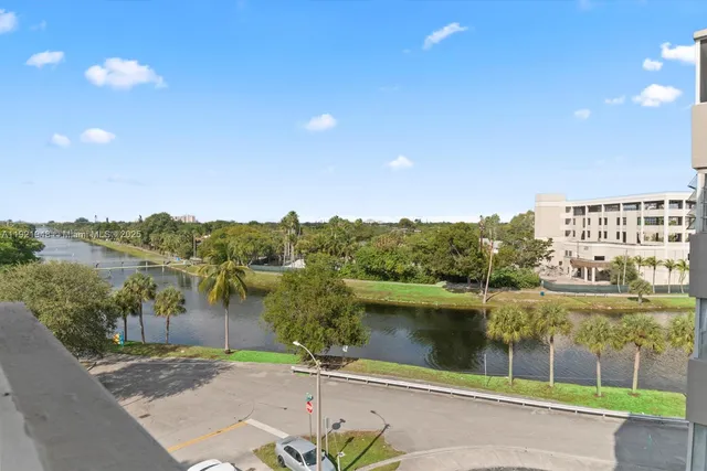 a view of a lake with a city