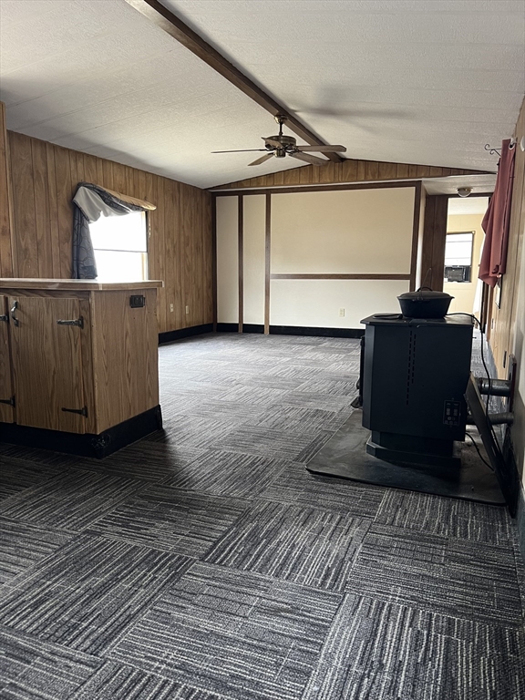 51 Monson Turnpike Road, Unit 1042 Ware, MA 01082 - Photo 6 of 14 a living room with a wooden floor
