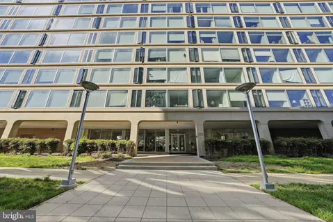 a view of a building with a street