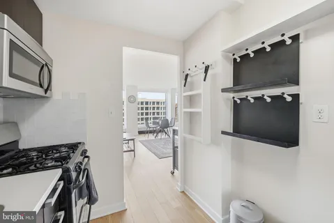 a view of a livingroom with furniture and flat screen tv