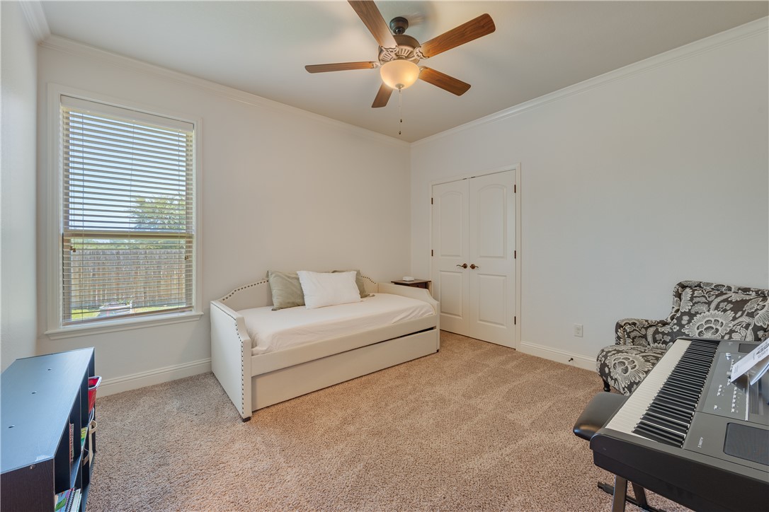 3301 Covington Court Bryan, TX 77808 - Photo 16 of 26 a living room with furniture and a window