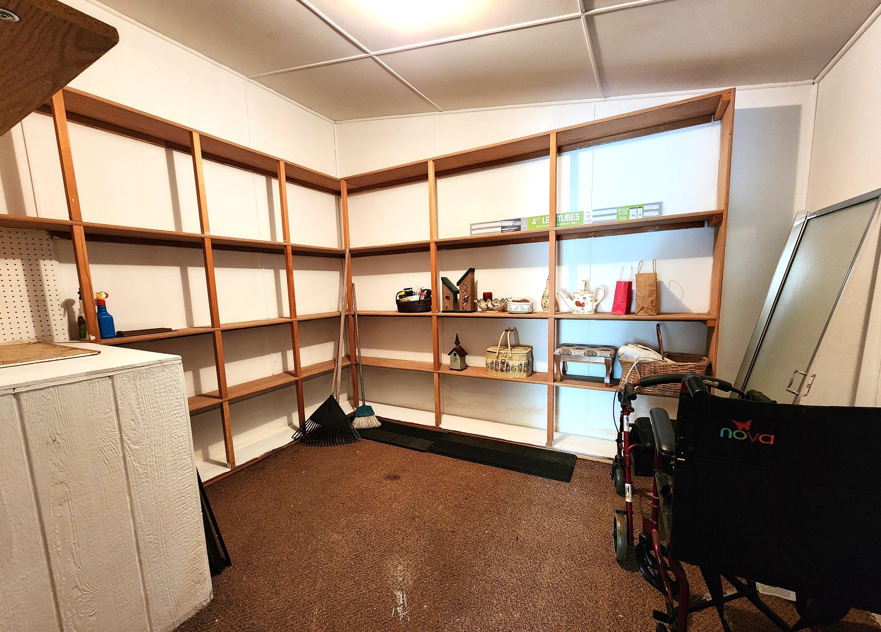 1001 Southeast 15th Street, Unit 34 Bend, OR 97702 - Photo 38 of 43 Large storage shed with light and shelving