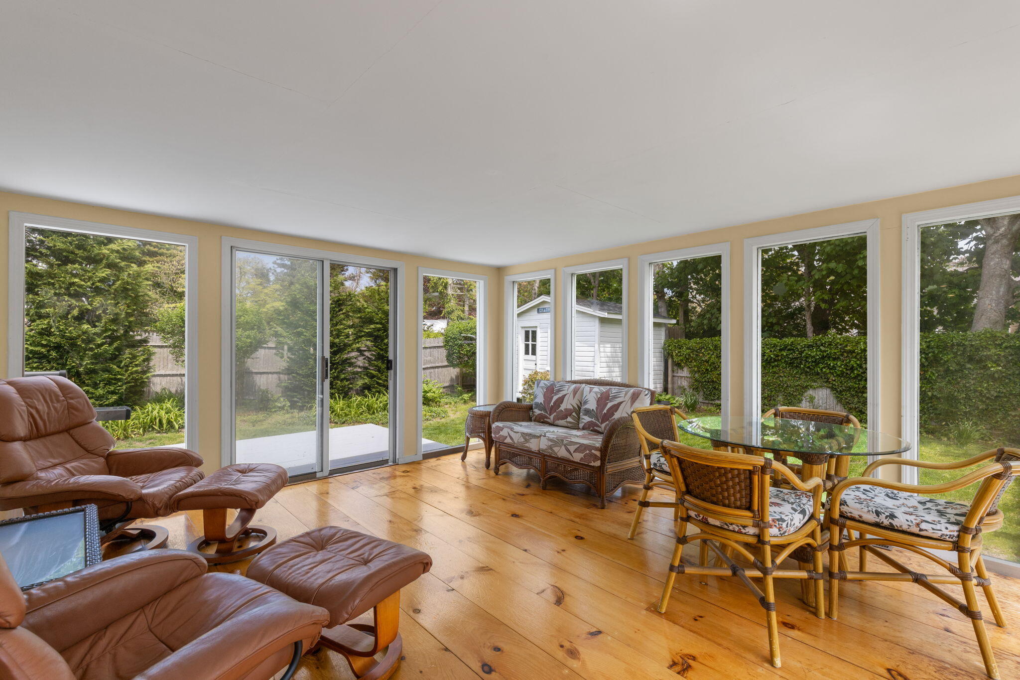 7 Aunt Matties Road Chatham, MA 02633 - Photo 10 of 37 a living room with furniture and a floor to ceiling window
