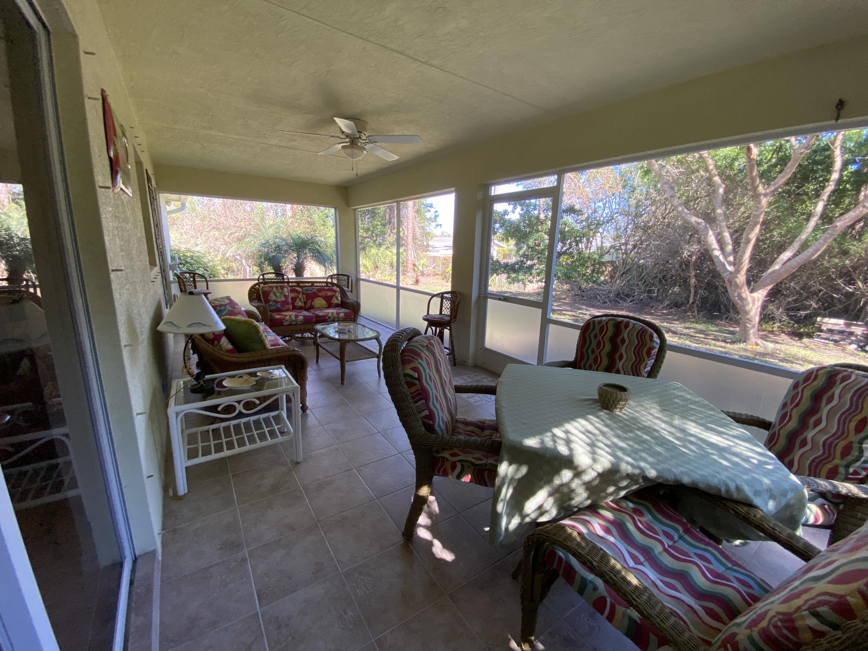5300 Seagrape Drive Fort Pierce, FL 34982 - Photo 20 of 25 Screened in Porch / Patio