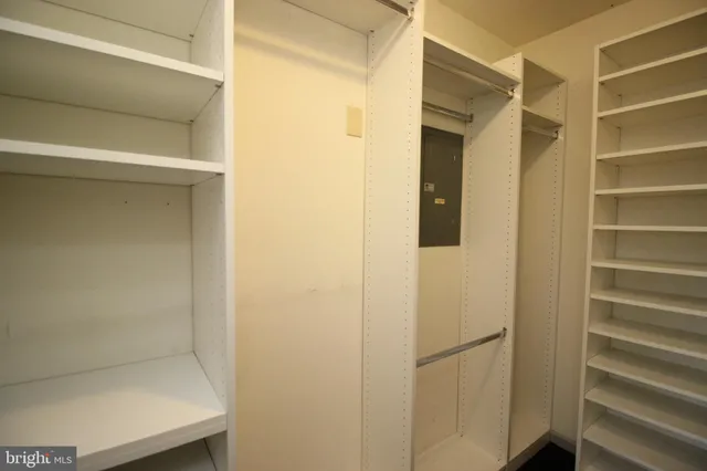 a bathroom with a glass door shower