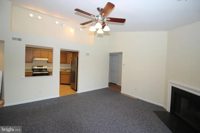 a view of a livingroom with a flat screen tv