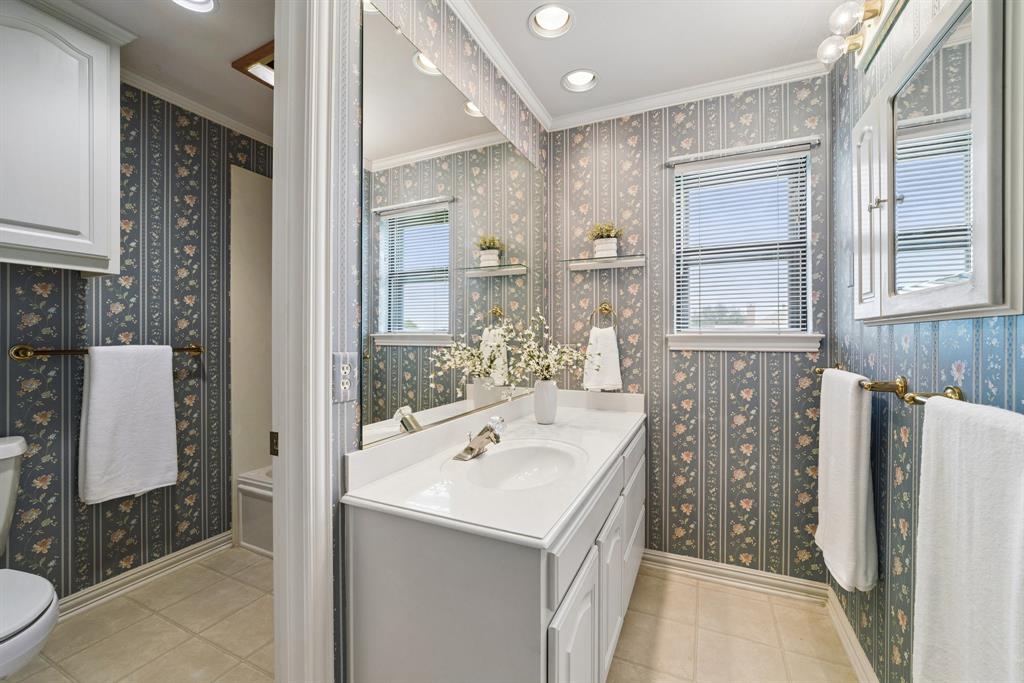 1175 Bloom Street Lucas, TX 75002 - Photo 25 of 36 a bathroom with a sink a toilet and shower