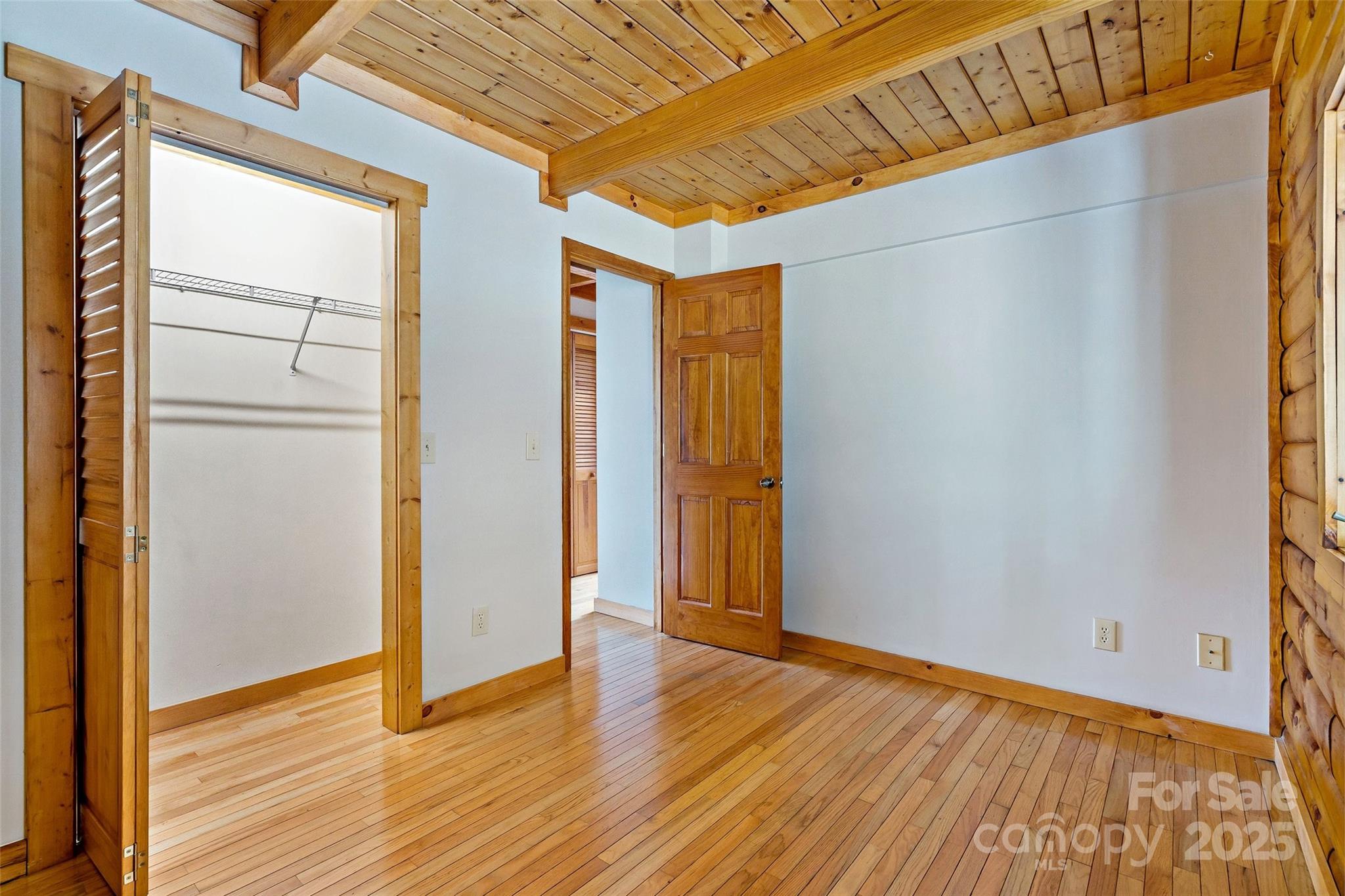 580 Red Dirt Road Newland, NC 28657 - Photo 19 of 48 a view of empty room with wooden floor