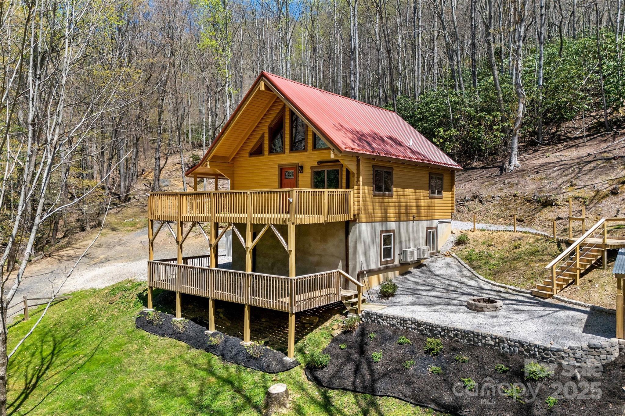 580 Red Dirt Road Newland, NC 28657 - Photo 2 of 48 a view of a house with a yard