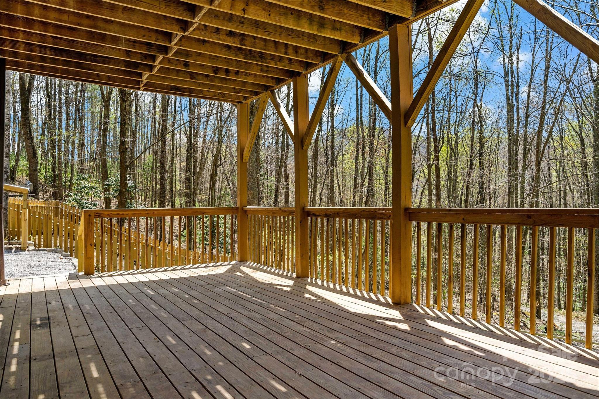 580 Red Dirt Road Newland, NC 28657 - Photo 29 of 48 a view of deck with wooden floor