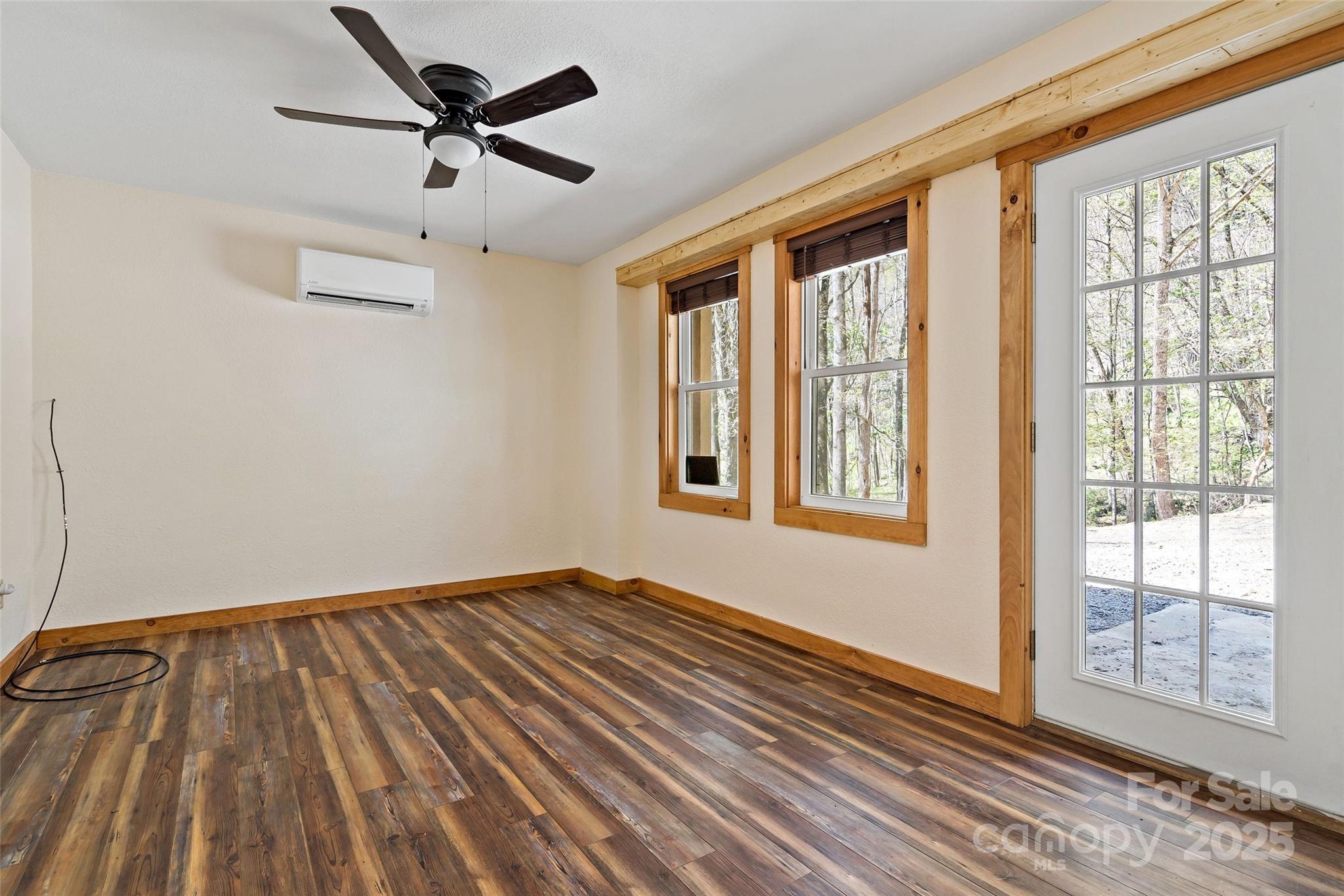 580 Red Dirt Road Newland, NC 28657 - Photo 30 of 48 a view of an empty room with windows