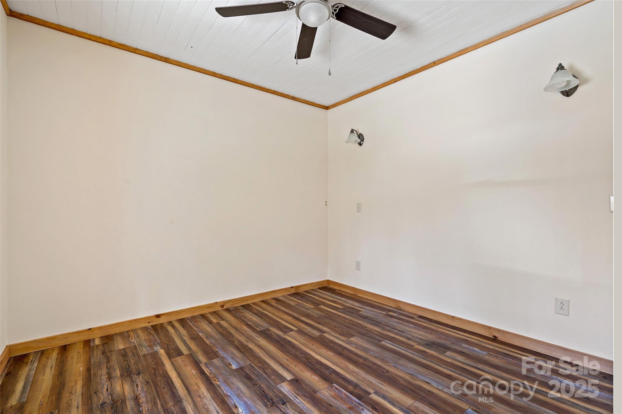 580 Red Dirt Road Newland, NC 28657 - Photo 39 of 48 a view of a room with wooden floor