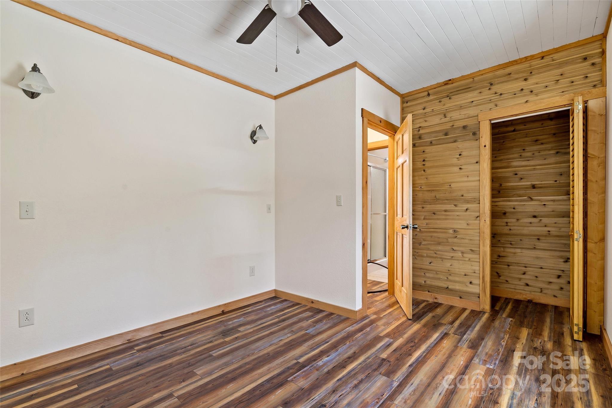 580 Red Dirt Road Newland, NC 28657 - Photo 40 of 48 wooden floor in an empty room