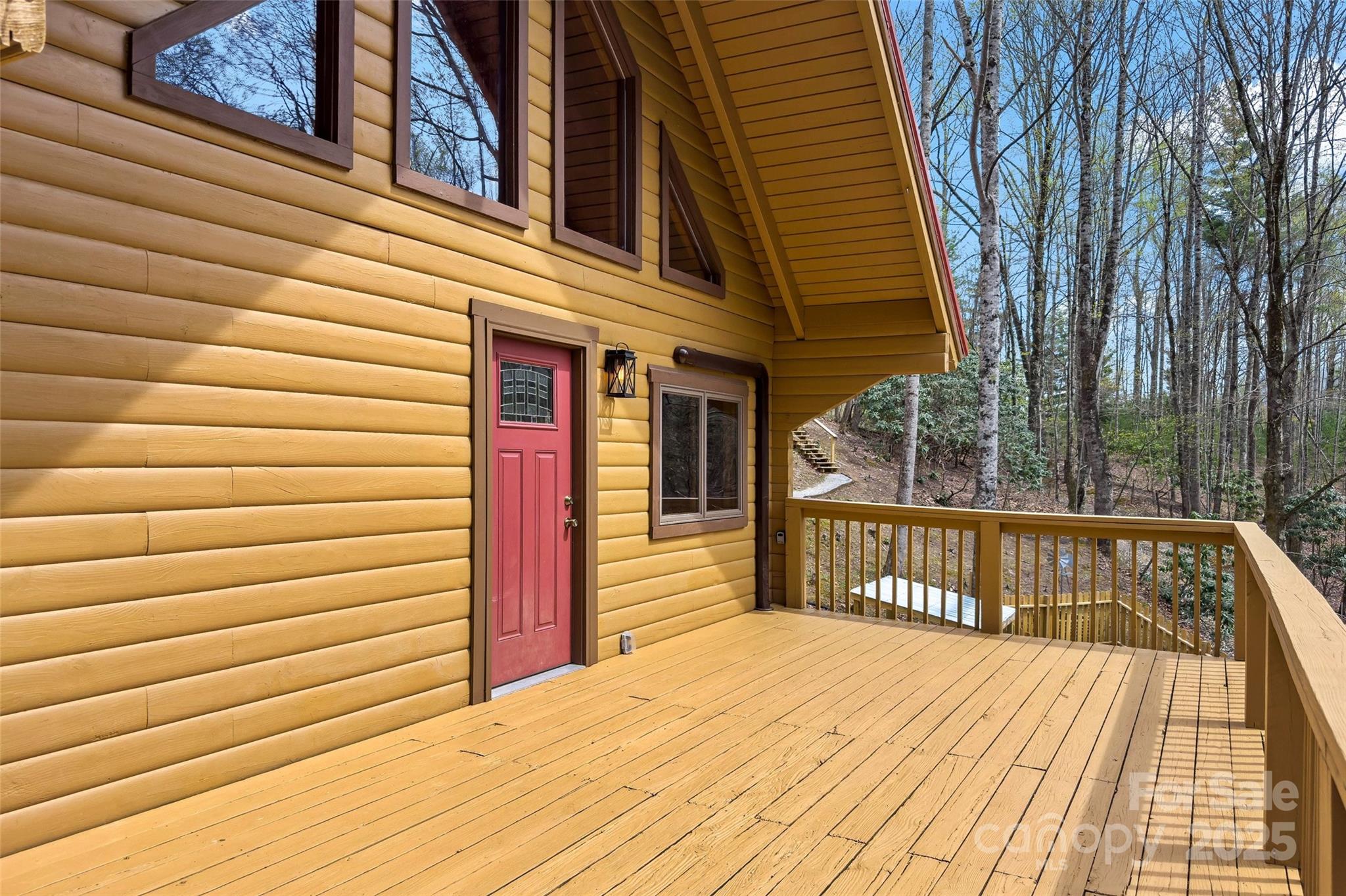 580 Red Dirt Road Newland, NC 28657 - Photo 6 of 48 a view of a wooden deck