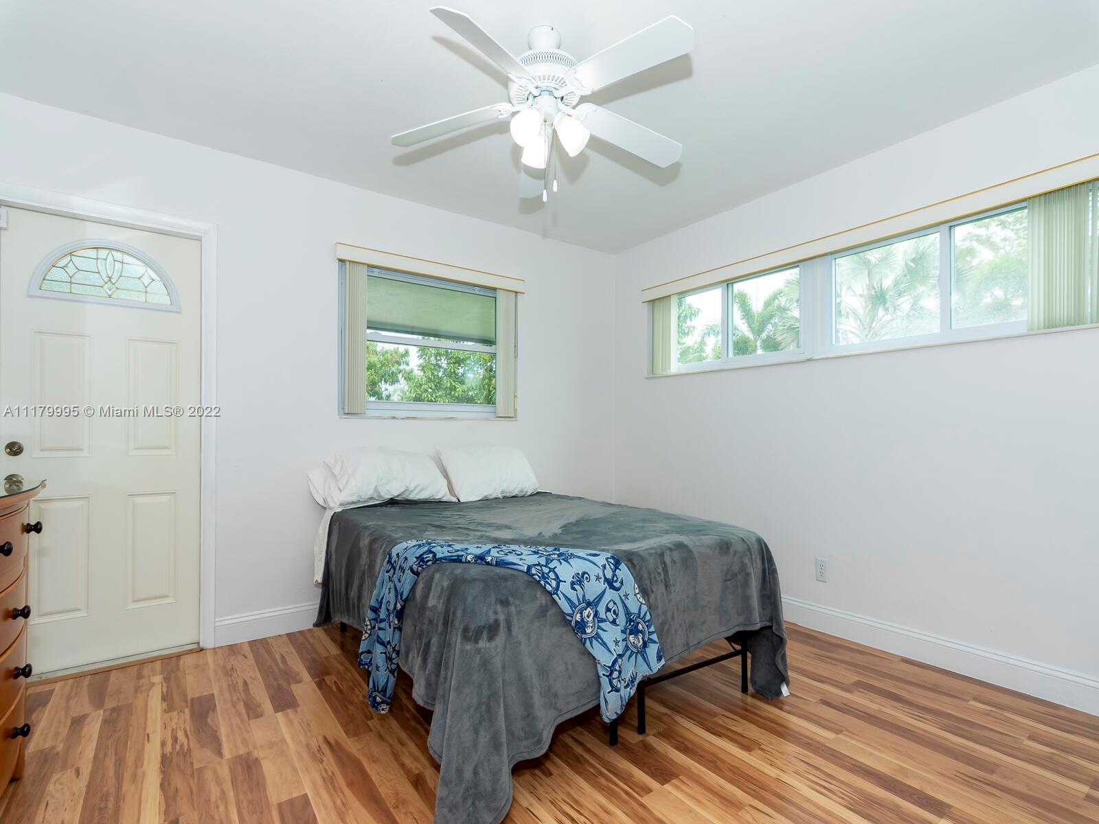 4401 West Park Road Hollywood, FL 33021 - Photo 17 of 23 a bedroom with a bed and a window