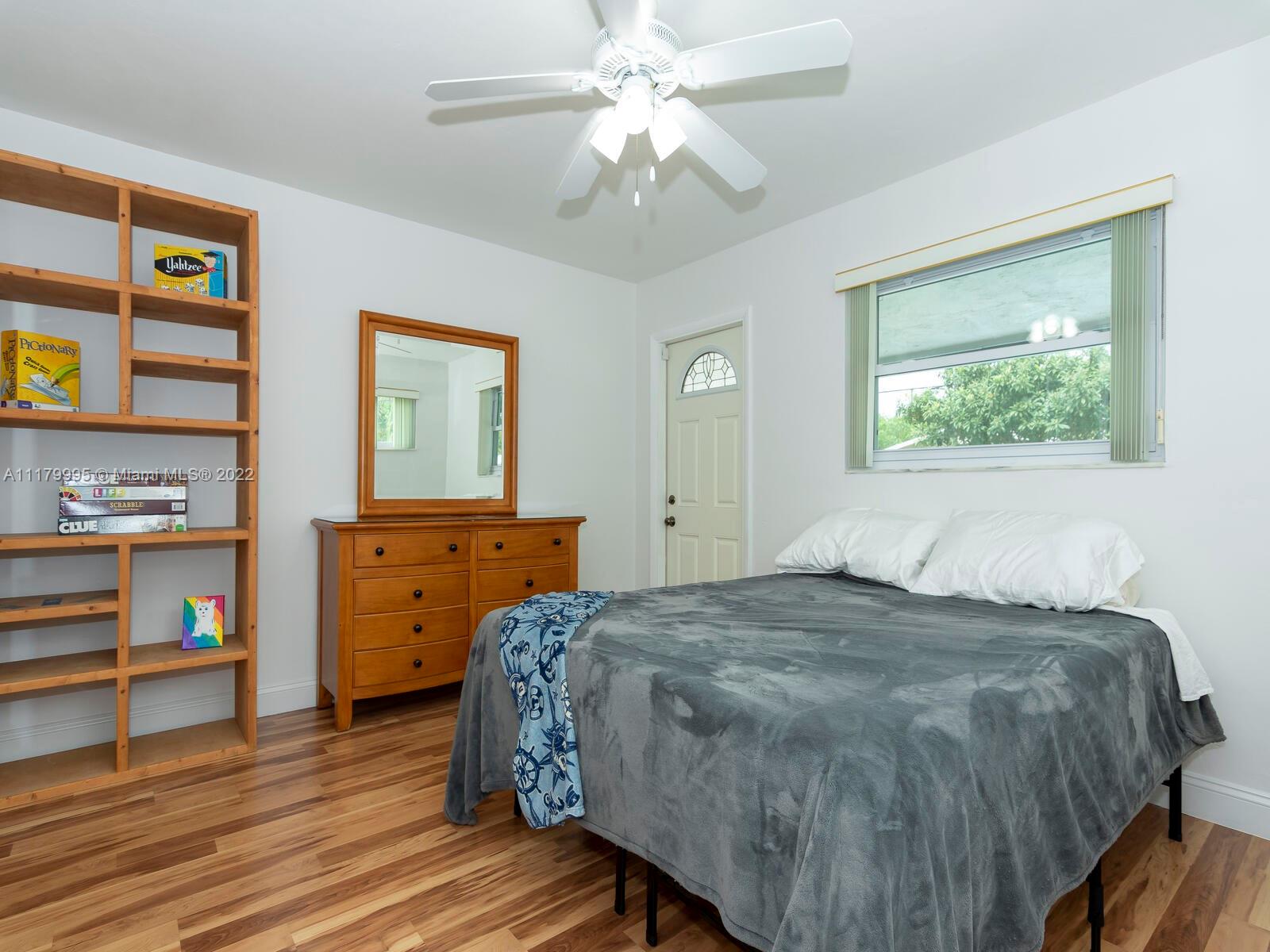 4401 West Park Road Hollywood, FL 33021 - Photo 18 of 23 a bedroom with a bed and a dresser