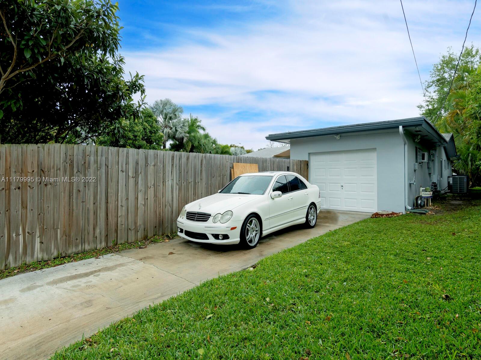 4401 West Park Road Hollywood, FL 33021 - Photo 23 of 23 a car parked in front of a house