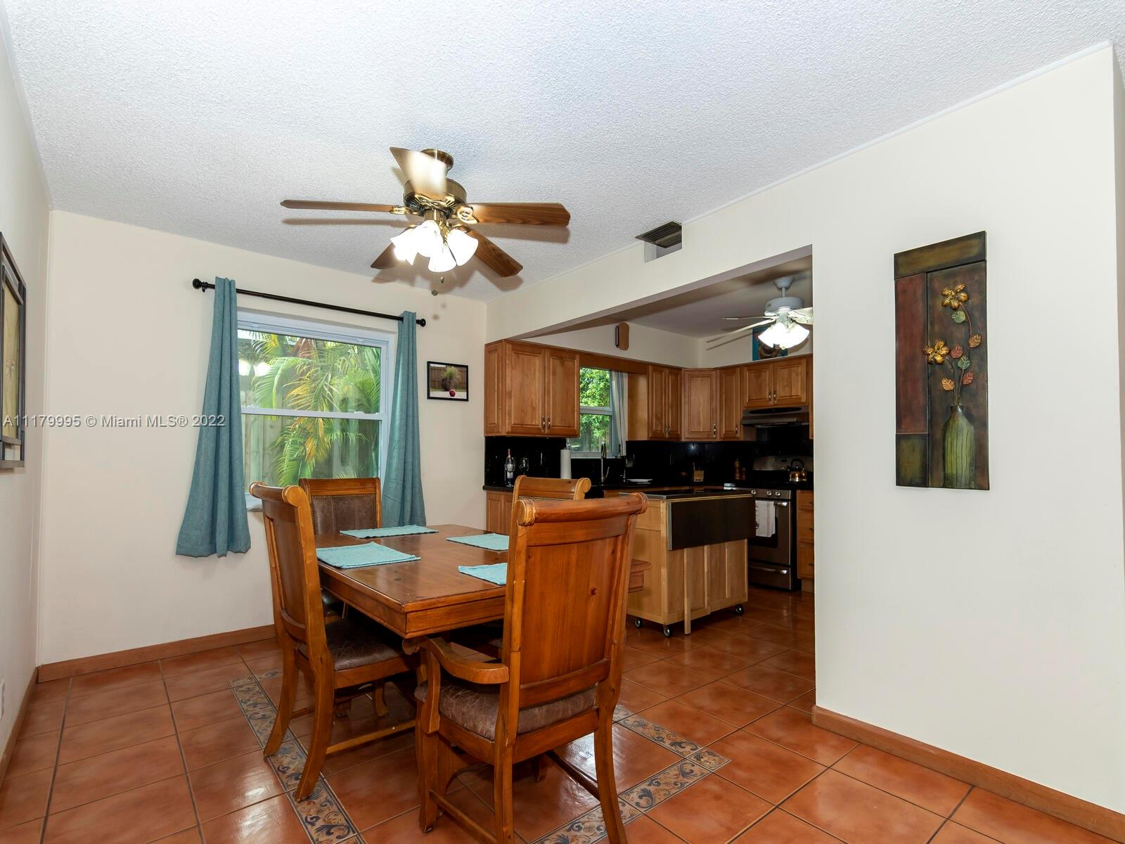 4401 West Park Road Hollywood, FL 33021 - Photo 6 of 23 a dining room with furniture and window