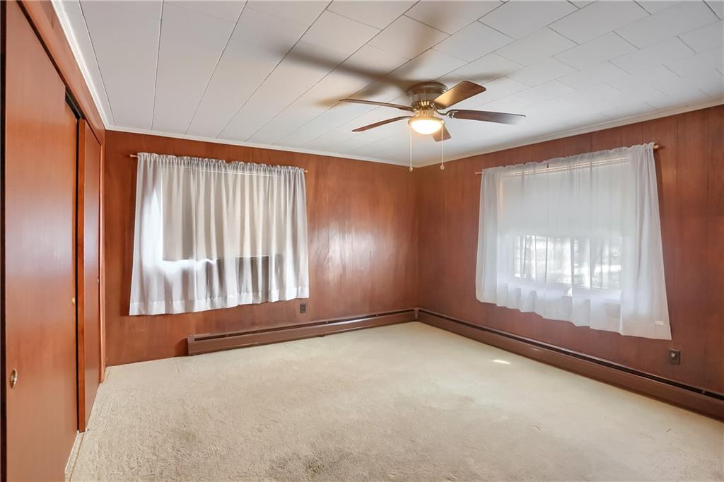 1215 Mt Jackson Road New Castle, PA 16102 - Photo 10 of 24 an empty room with windows and fan
