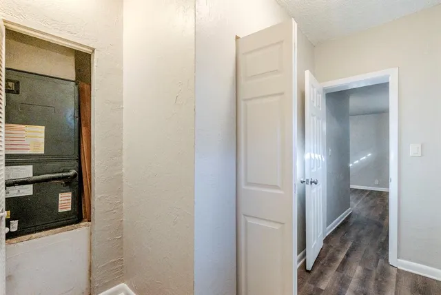 a view of a bathroom from a hallway