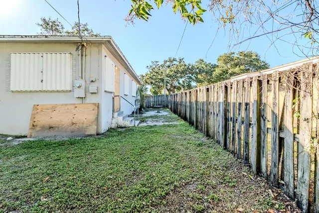 a view of a garden with a tree