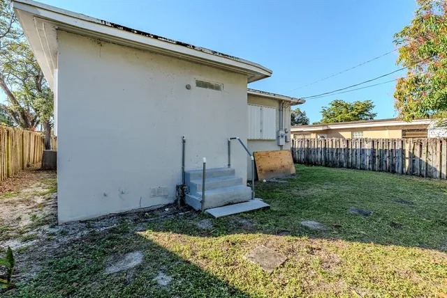 a view of a garden with a tree
