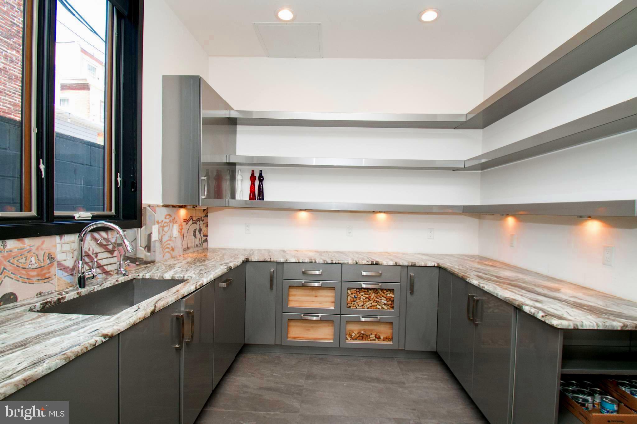 243 Tasker Street Philadelphia, PA 19148 - Photo 13 of 75 Huge walk-in pantry right off of kitchen.