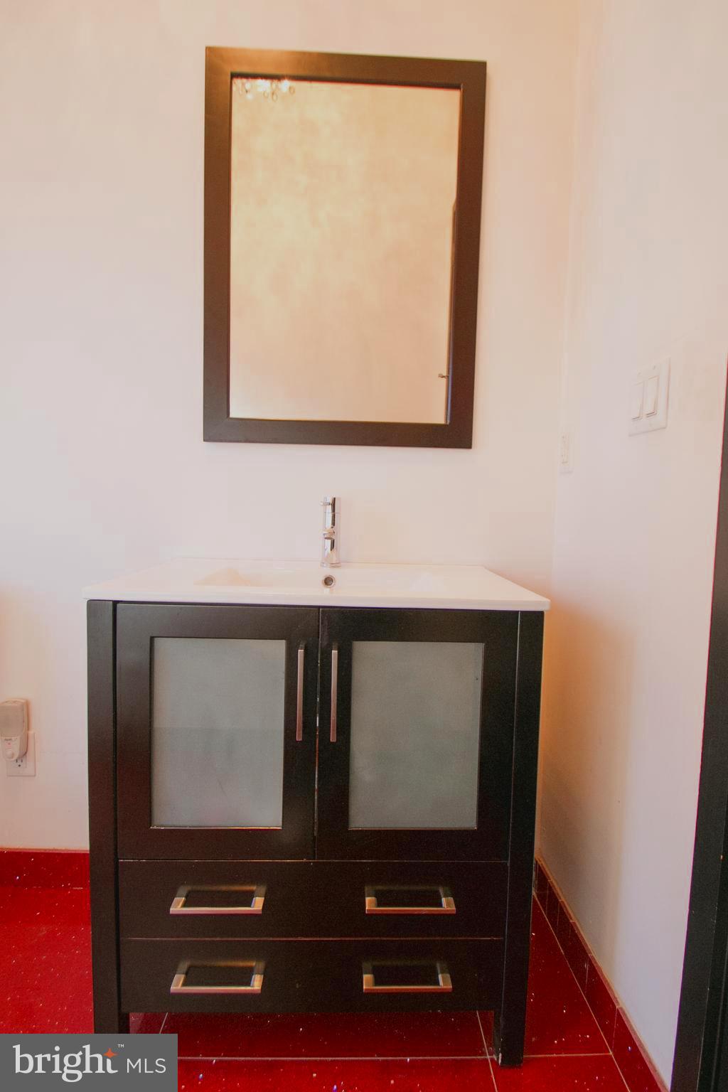 243 Tasker Street Philadelphia, PA 19148 - Photo 18 of 75 Vanity in powder room