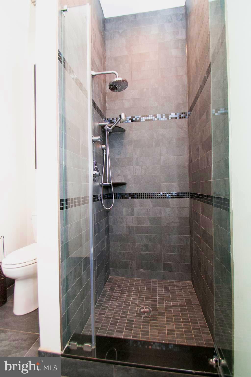 243 Tasker Street Philadelphia, PA 19148 - Photo 23 of 75 Full bathroom off of bonus room.