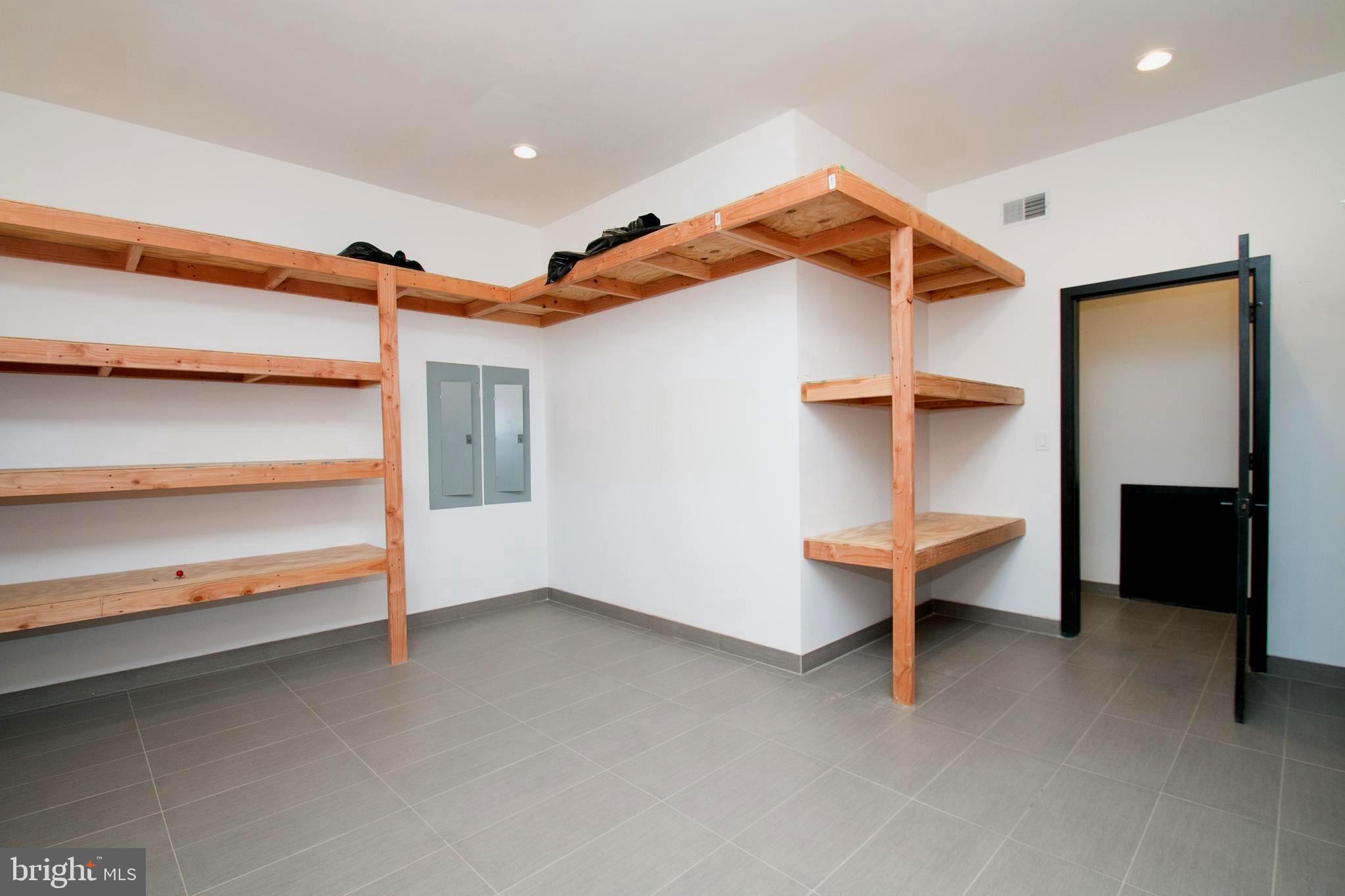 243 Tasker Street Philadelphia, PA 19148 - Photo 61 of 75 Basement storage