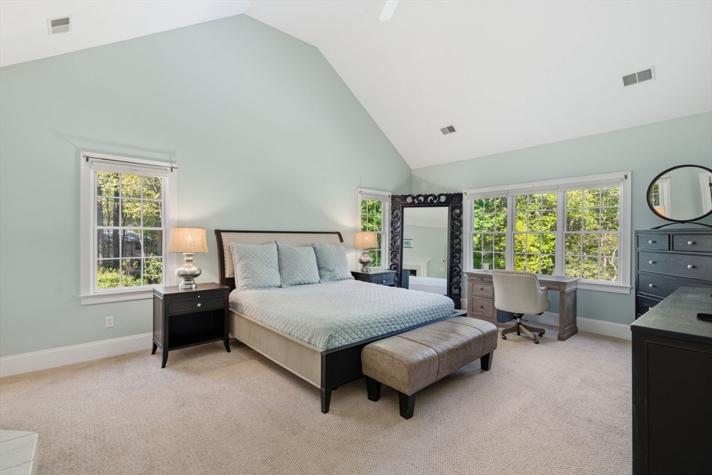 220 Newtown Road Acton, MA 01720 - Photo 15 of 39 a bedroom with a bed and large window