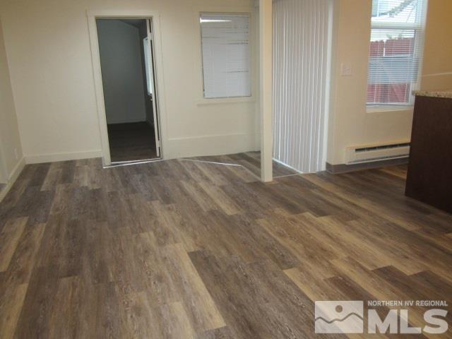 1440 Lander Street Reno, NV 89509 - Photo 15 of 22 an empty room with wooden floor and windows