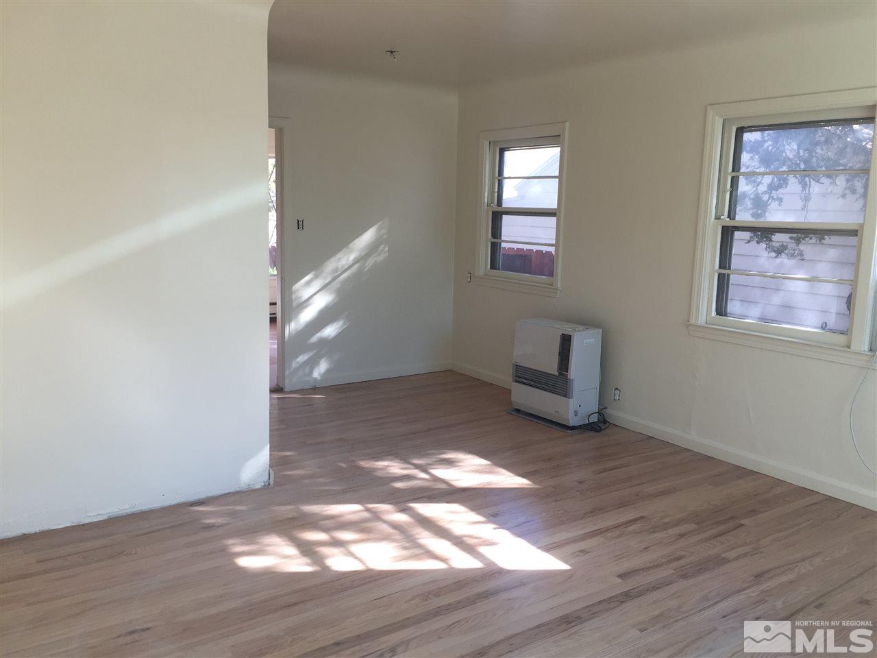 1440 Lander Street Reno, NV 89509 - Photo 3 of 22 a view of entryway and hall with wooden floor