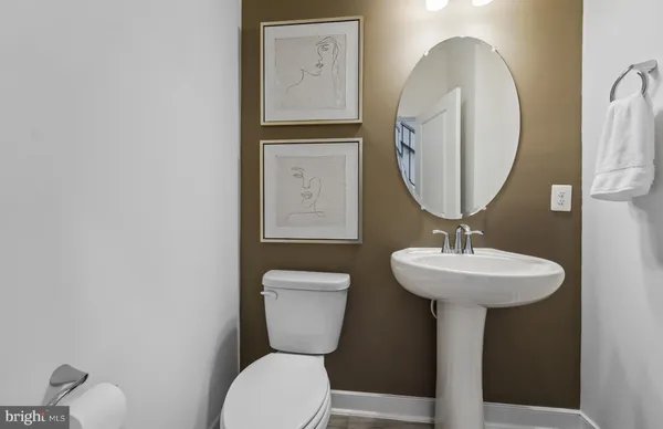 a large kitchen with stainless steel appliances kitchen island a large island in the center