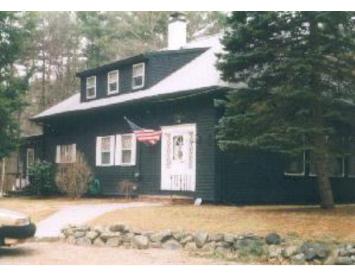 36 Ipswich Road Boxford, MA 01921 - Photo 1 of 1 a front view of a house with a yard
