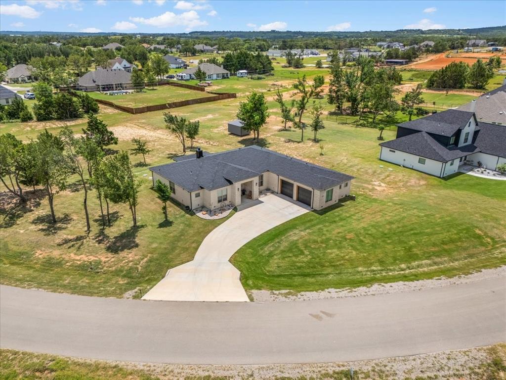 1039 Monaco Court Springtown, TX 76082 - Photo 29 of 33 Aerial view of home and 1 acre featuring new roof
