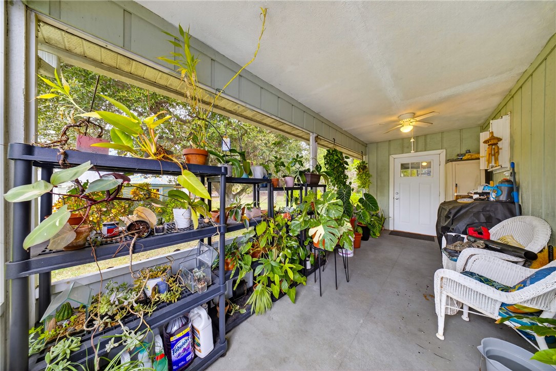 5809 Seagrape Drive Fort Pierce, FL 34982 - Photo 27 of 35 a room with lots of different kinds of flowers