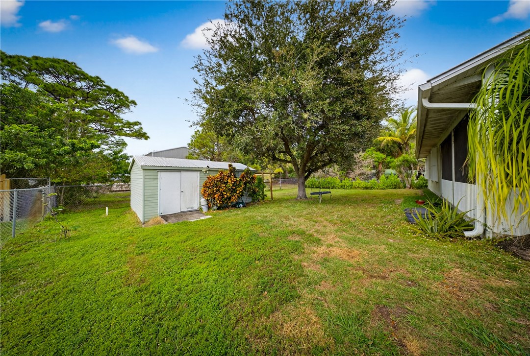 5809 Seagrape Drive Fort Pierce, FL 34982 - Photo 31 of 35 a view of a garden area