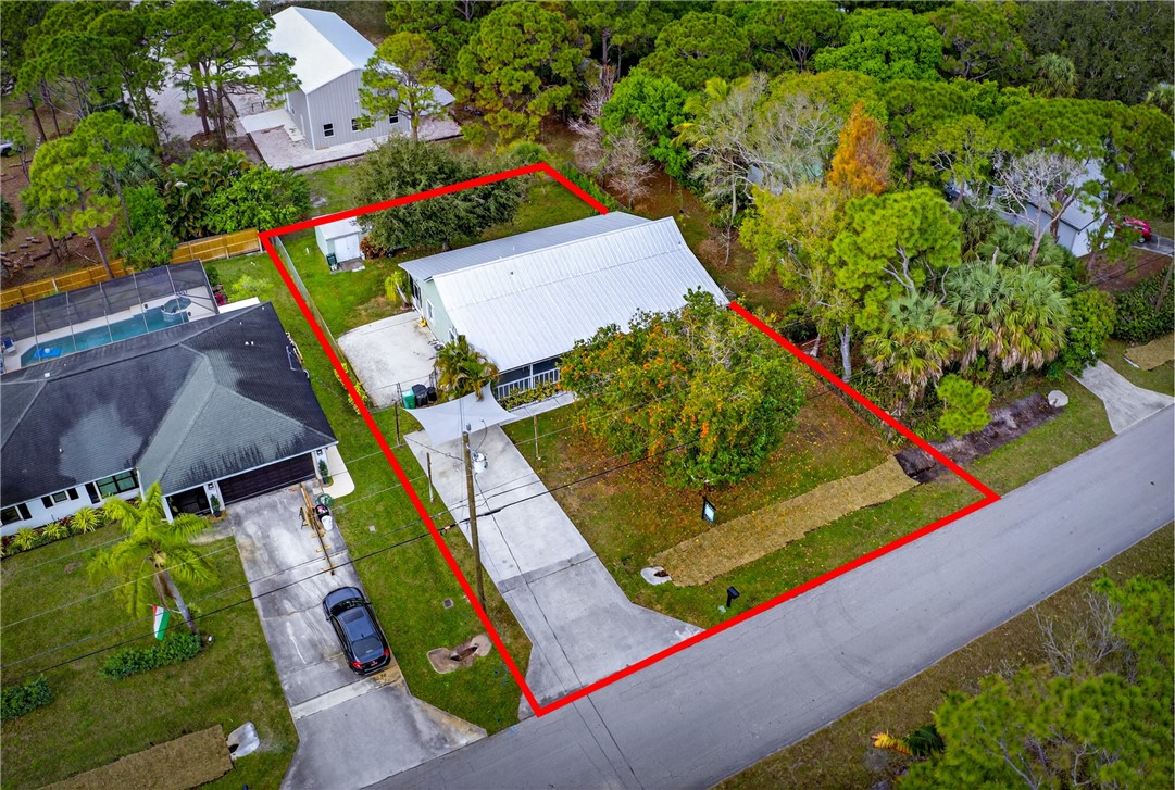 5809 Seagrape Drive Fort Pierce, FL 34982 - Photo 33 of 35 an aerial view of a yard