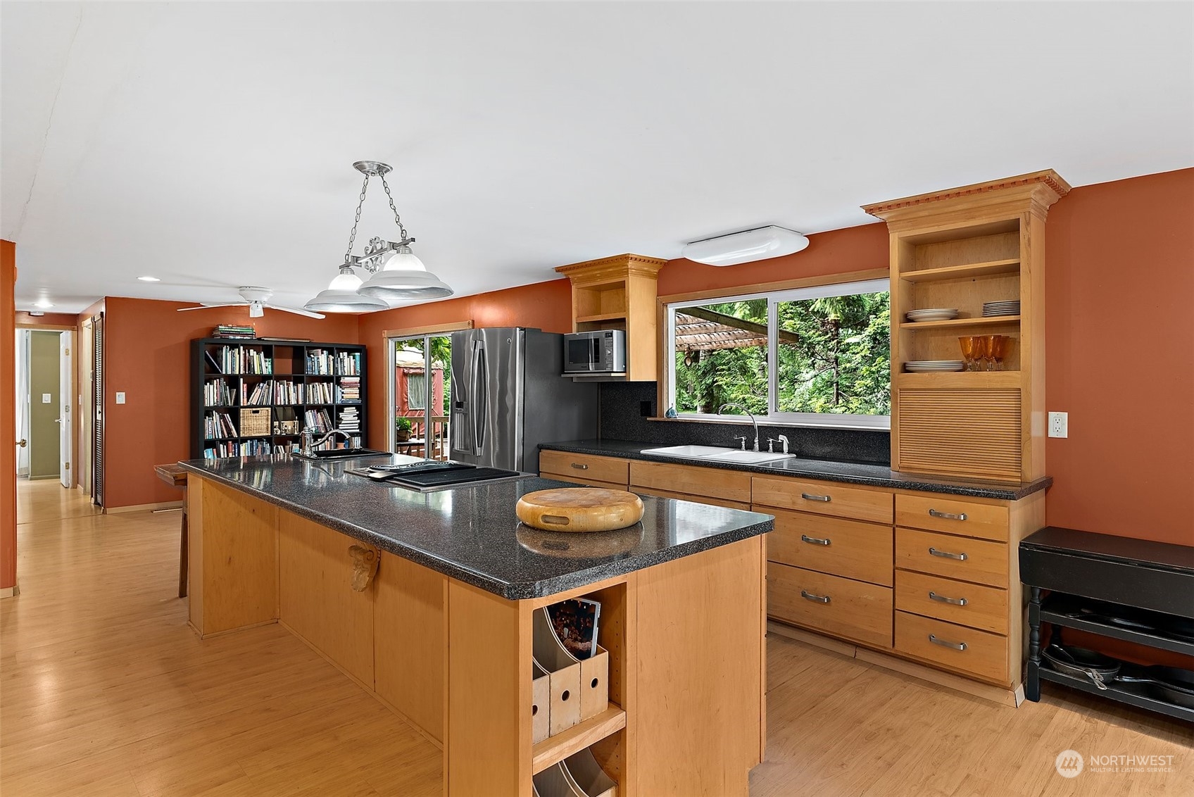 411 Leudinghaus Road Chehalis, WA 98532 - Photo 8 of 25 a kitchen with stainless steel appliances granite countertop a sink a stove and a wooden floor