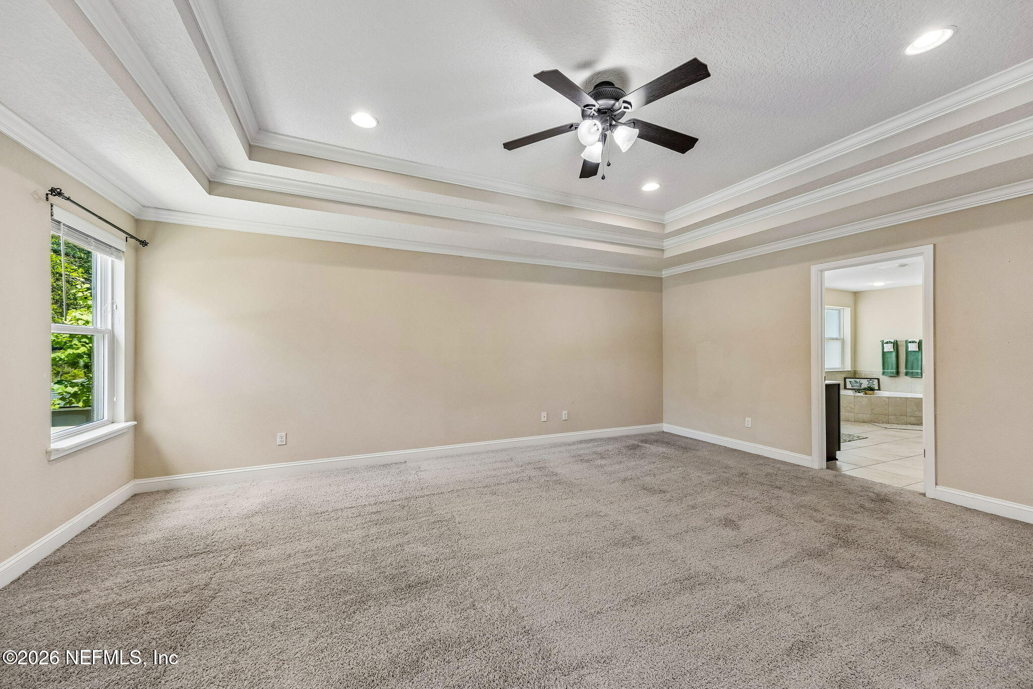 12198 Ridge Crossing Way Jacksonville, FL 32226 - Photo 26 of 67 a view of an empty room with a window
