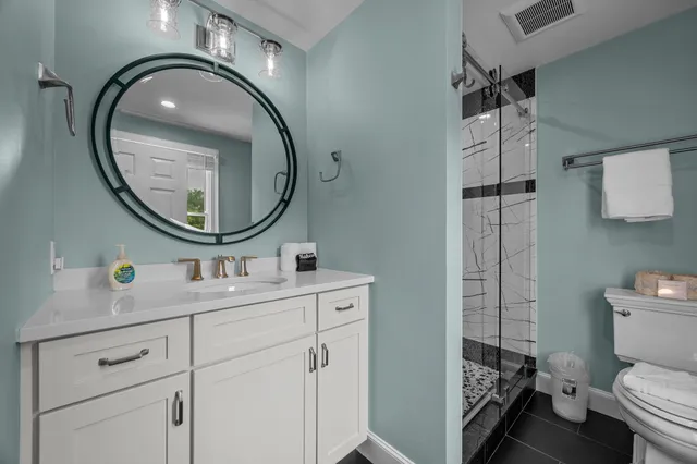 a room with furniture and wooden floor