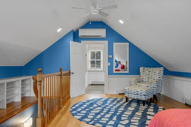 a view of a chair and table on the garden